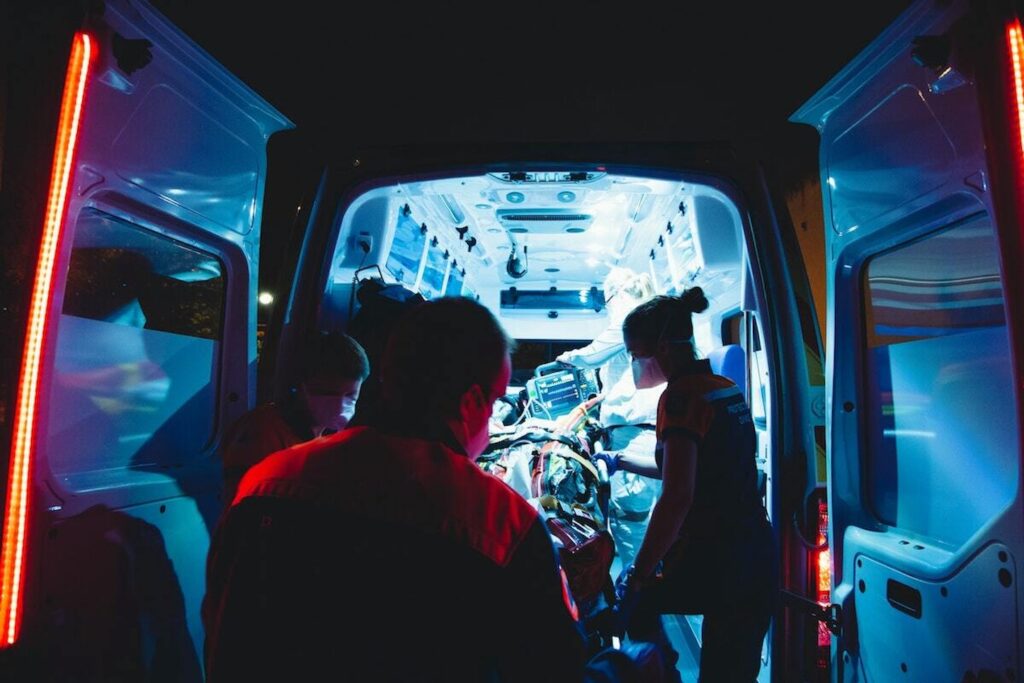 Emergency medical personnel in an ambulance.